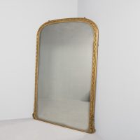 Very large, decorative Victorian gilded arched-top mirror, in exceptional condition