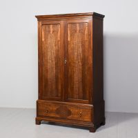 Quality Whytock and Reid neat-sized, two-door mahogany wardrobe with sycamore and figured walnut panelled doors