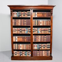 Tall Victorian two-section mahogany open bookcase with 5 shelves.