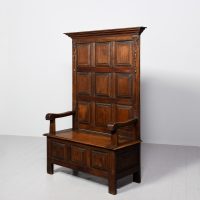 Victorian tall panelled-oak hall settle, with storage