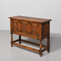 Attractive golden oak Jacobean-style trunk on stand