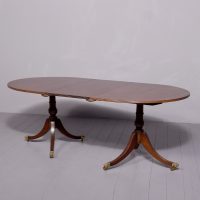 George III style pedestal mahogany dining table with additional leaf