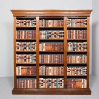 Tall straight-grained walnut Victorian three-section open bookcase