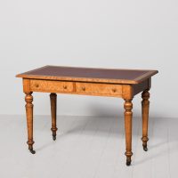 Attractive Victorian birds-eye maple writing table or desk with a gilt-tooled burgundy leather writing surface