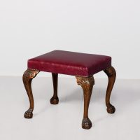 George III style rectangular stool upholstered in a quality burgundy hide with brass studding