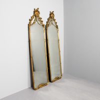 Rare pair of original 19th-century tall, gilded pier mirrors of exceptional quality
