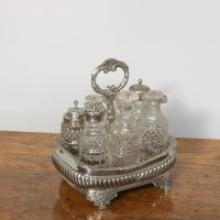 Solid silver cruet set on stand hallmarked London 1819, made by Charles Thomas Fox