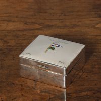 Solid silver box with enamelled nautical flags on the lid and engraved COCK-Y-BONDHU  1904