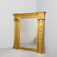 Large Giltwood neoclassical style 19th-century overmantel mirror with neoclassical decorations