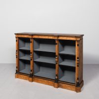 Outstanding quality Arts and Crafts influence burr walnut three-section low, open bookcase