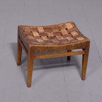 A neat-sized leather oak Thebes type stool