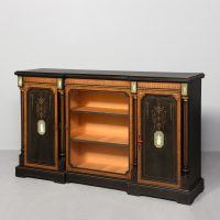 Superb quality Aesthetic movement ebonized and inlaid amboyna three-door credenza