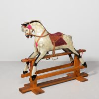 Large wooden dappled-grey Rocking Horse with leather saddle and real horsehair