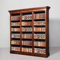 Tall mid-Victorian mahogany three section, open bookcase