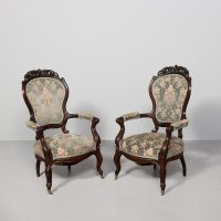 Pair of generously-sized, Victorian carved rosewood cabriole leg armchairs