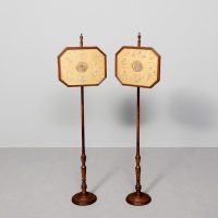 Rare pair of George III embroidered silk poles-screens in octagonal fluted mahogany frames, in original condition.