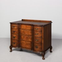 Serpentine fronted chest of drawers by Maple &amp; Company