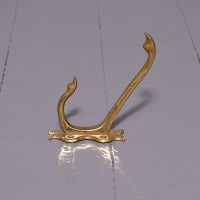 Large set of 21 Cast Brass Double Wall Hooks
