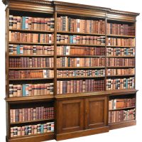 A large mid-Victorian oak open bookcase