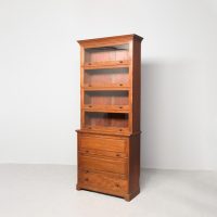 Rare, tall sectional bookcase with mahogany panelled doors &amp; drawer to the base.