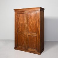 William IV mahogany two-door fitted wardrobe, with panelled doors and flexible interior