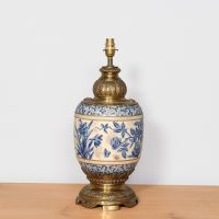 Brass-mounted pottery table lamp in the Arts and Crafts style
