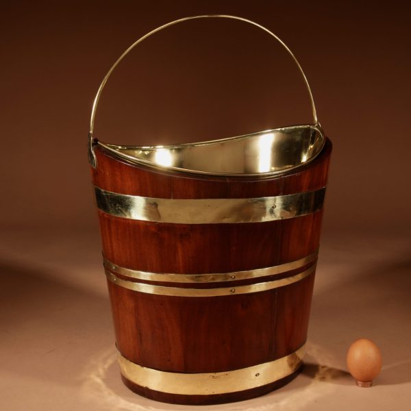 A Fine Quality Mahogany Brass Bound Boat (Schuitje) Shaped Peat Bucket Tea Stove Jardinière.
