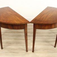A Pair of Georgian Mahogany Semi Circle Console Tables