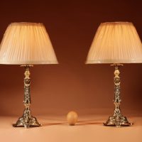 A Small Pair Of Cast Brass Elegant Table Lamps In The Louis XVI Style Circa 1900-20.