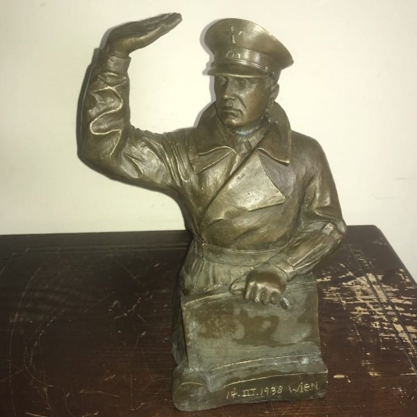 Adolph Hitler taking the salute of the people
