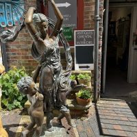 Bronze Statue of Classical lady with Cherubs