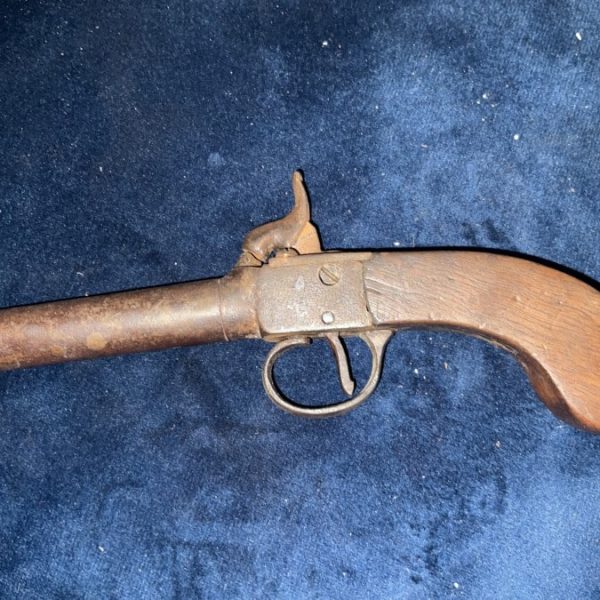 Pistol percussion pocket.