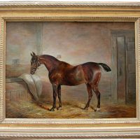 Racehorse in the stable by Thomas Hillier Mew (fl.1850-1875)