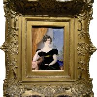 English miniature painter, ca.1815, large miniature of a lady, seated in a chair, a landscape in the background