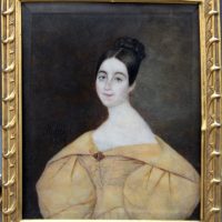 Jean Pierre Robelot ( French, born 1802) Portrait miniature of a young lady in yellow dress