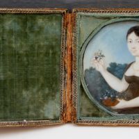 Joseph Guis (? – 1837) Portrait miniature of a young lady in a landscape