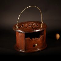 An Oval 19th Century Oak Dutch Foot Stove.