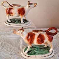 Pair of Antique English Victorian Staffordshire Pottery Cow Creamers