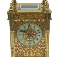 Highly Collectable Carriage Clock with fretwork panels to all sides and the masked dial – French 8-Day Timepiece Movement.