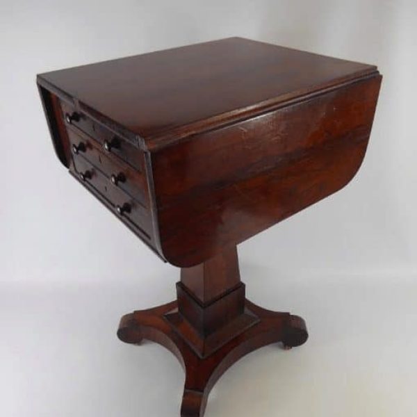 Victorian rosewood three drawer pedestal side drop leaf table.