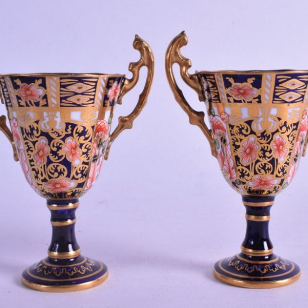 SOLD PAIR OF ROYAL CROWN DERBY TROPHY SHAPED VASES