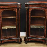 A pair of Victorian amboyna side cabinets
