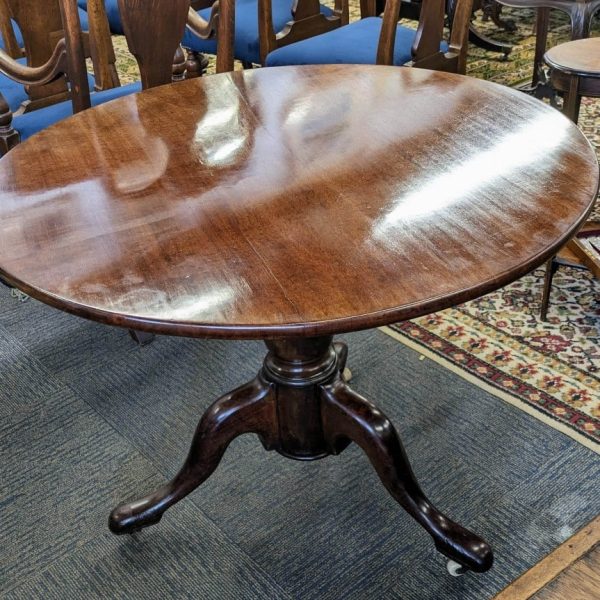 Tilt top dining table