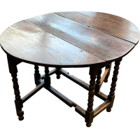 Early 19th century oak drop leaf table