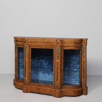 Quality, serpentine-front inlaid and figured walnut, three-door Victorian credenza