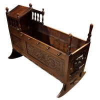 A 17th Century Style Oak Panelled Crib, circa mid-19th century
