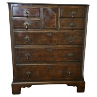 A Fine Bur Walnut and Oak Chest of Drawers The chest has can unusual combinatio