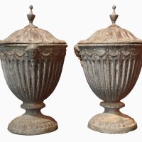 A Good Pair of Early 20th-Century Adam Style Lead Garden Urns with Covers