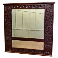 A Large Carved Oak Wall Mirror
