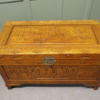 A Large Honey Coloured Carved Oriental Chest